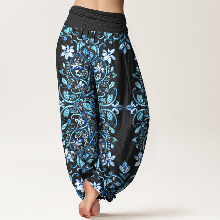 Pantaloni harem da donna con elastico in vita, in cotone, con motivo simmetrico di fiori e foglie, motivo Buddha Stones - image 1