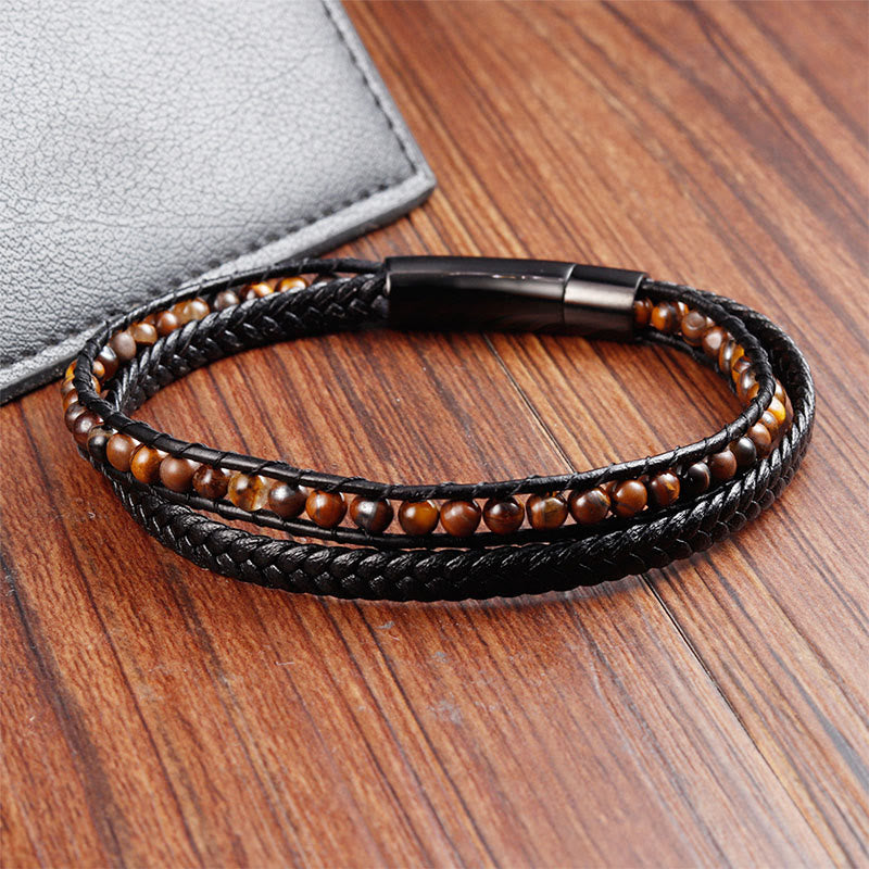 Bracciale in pelle rinforzata con protezione in acciaio al titanio e occhio di tigre Buddha Stones - image 1