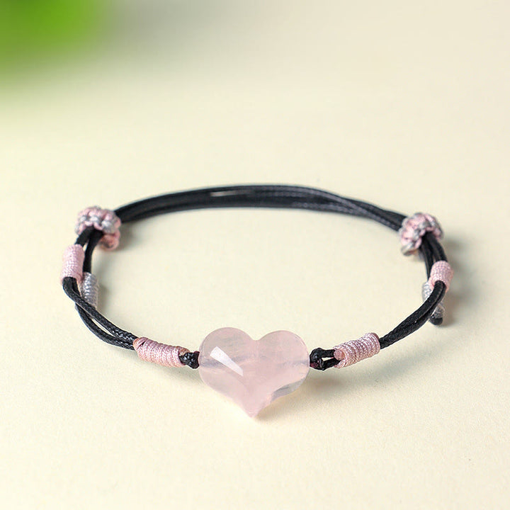 Braccialetto di calore con corda intrecciata in cristallo rosa e ciondolo a forma di cuore naturale Buddha Stones - image 1
