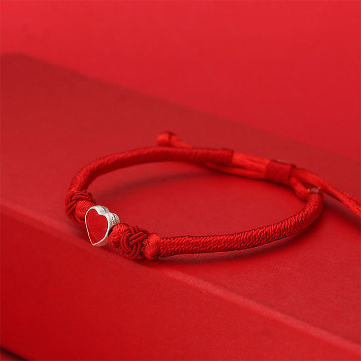Bracciale Buddha Stones in argento sterling 999 con design a cuore 3D e cordino rosso - image 1