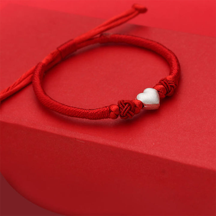 Bracciale Buddha Stones in argento sterling 999 con design a cuore 3D e cordino rosso - image 4