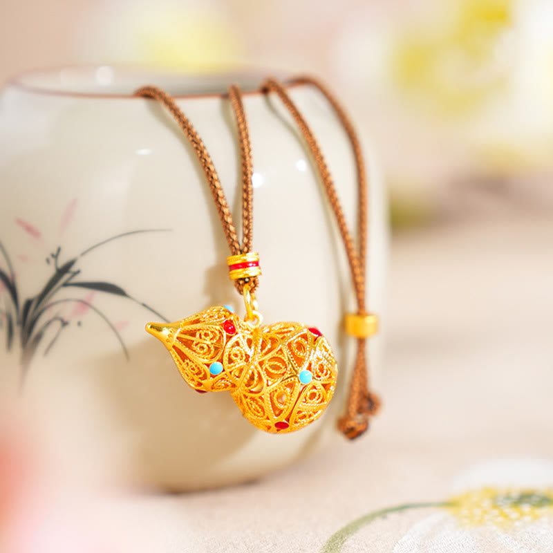 Collana con ciondolo in corda di ottone placcato oro 24k con design a zucca cava Buddha Stones - Zucca - image 1