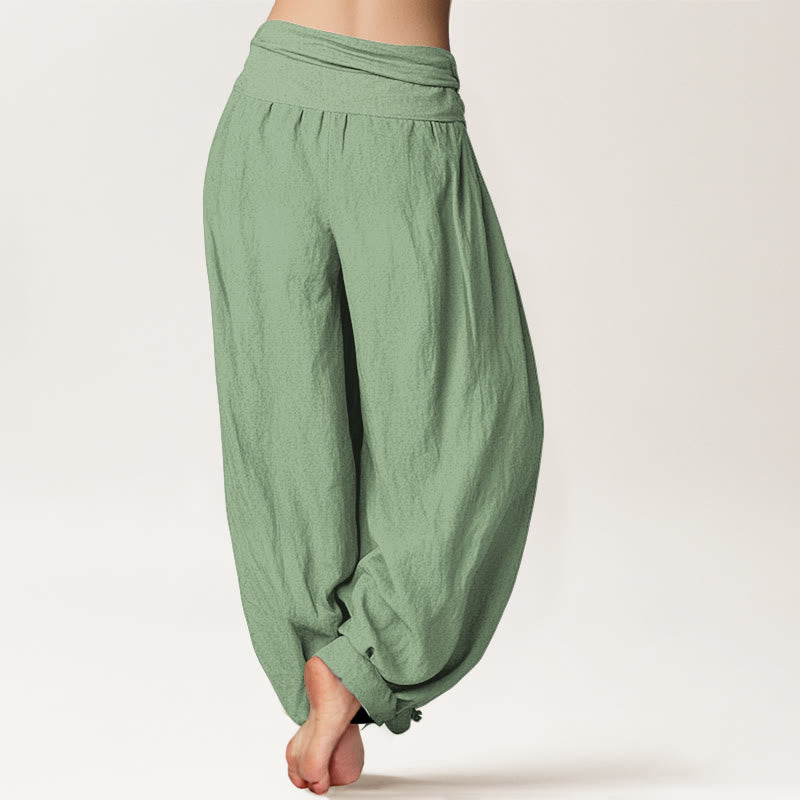 Pantaloni harem da donna in cotone verde tinta unita con elastico in vita Buddha Stones - image 1