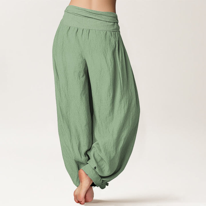 Pantaloni harem da donna in cotone verde tinta unita con elastico in vita Buddha Stones - image 1