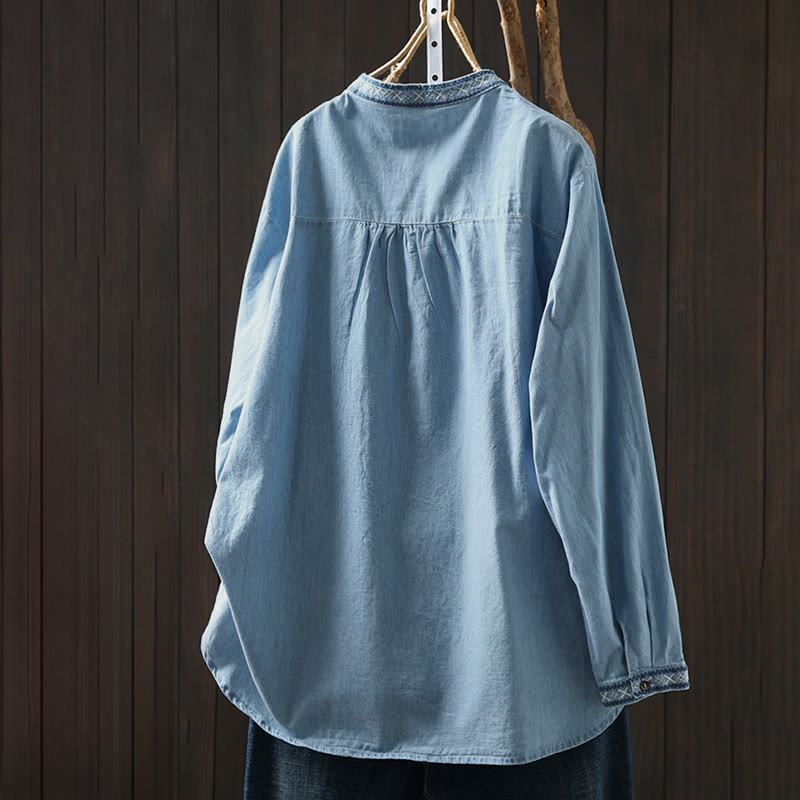 Camicia da donna a maniche lunghe in denim di cotone con bottoni mezzi, ricamo floreale e geometrie Buddha Stones - image 1