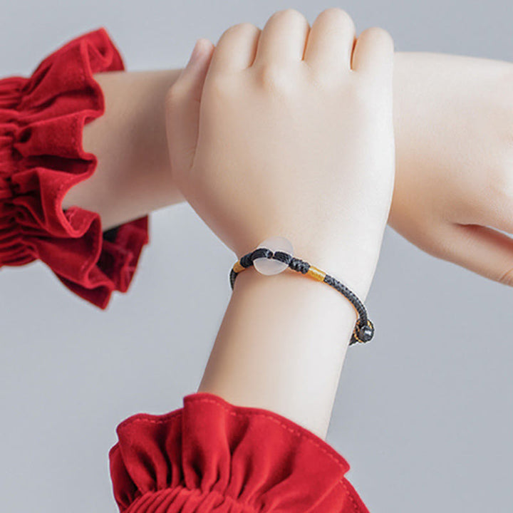 Bracciale intrecciato con fibbia della pace in calcedonio bianco Buddha Stones - image 13