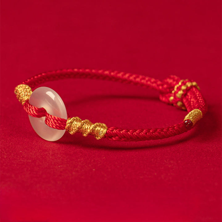 Bracciale con nodo di corda di collegamento con fibbia della pace in calcedonio bianco Buddha Stones - image 10