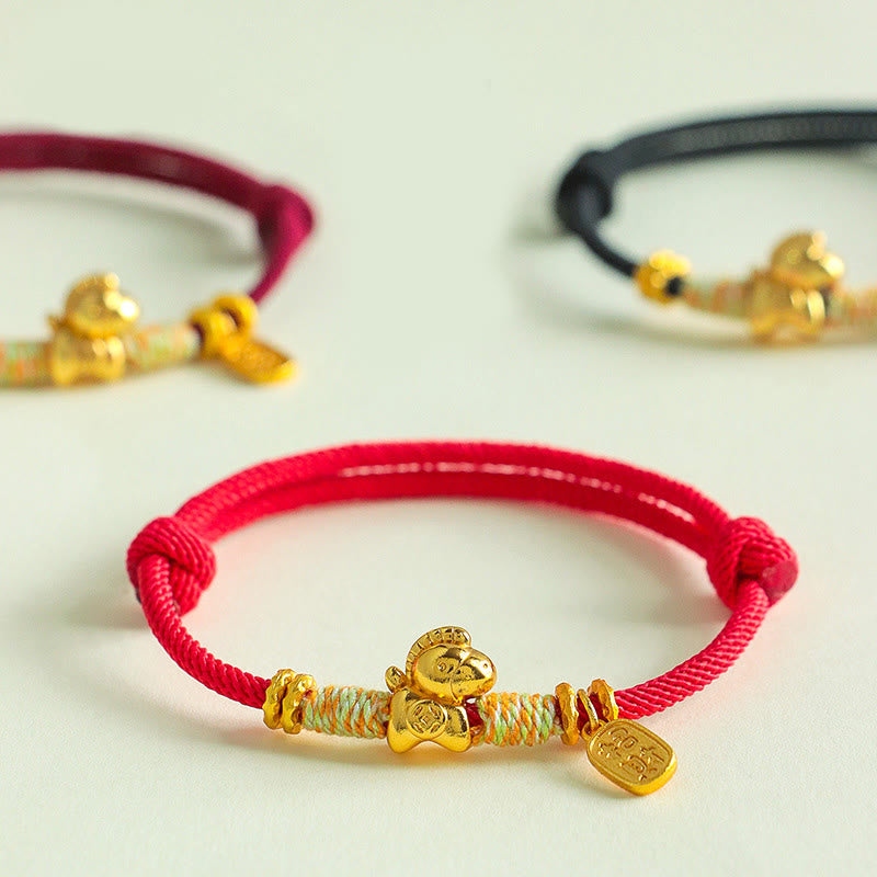 Bracciale intrecciato con ciondolo portafortuna e cordino rosso e nero dell'anno del cavallo Buddha Stones - image 0
