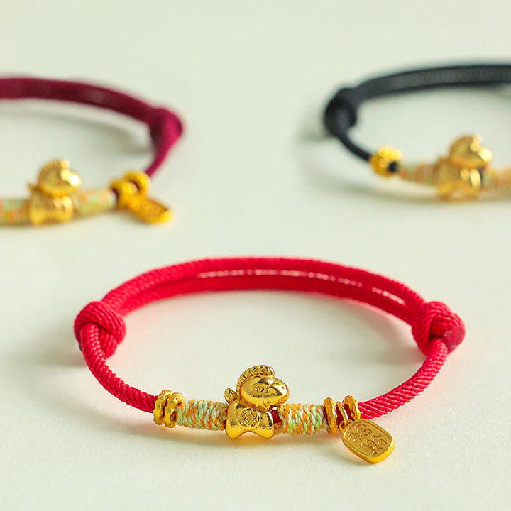 Bracciale intrecciato con ciondolo portafortuna e cordino rosso e nero dell'anno del cavallo Buddha Stones - image 0