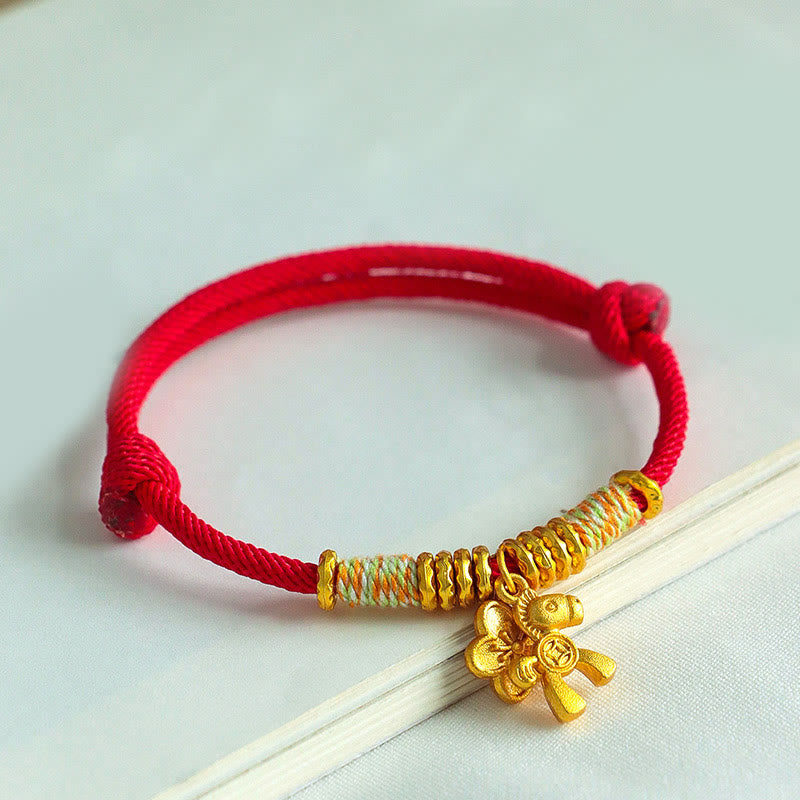 Braccialetto fatto a mano con ciondolo a forma di fiore dell'anno del cavallo con cordino rosso Buddha Stones - image 2