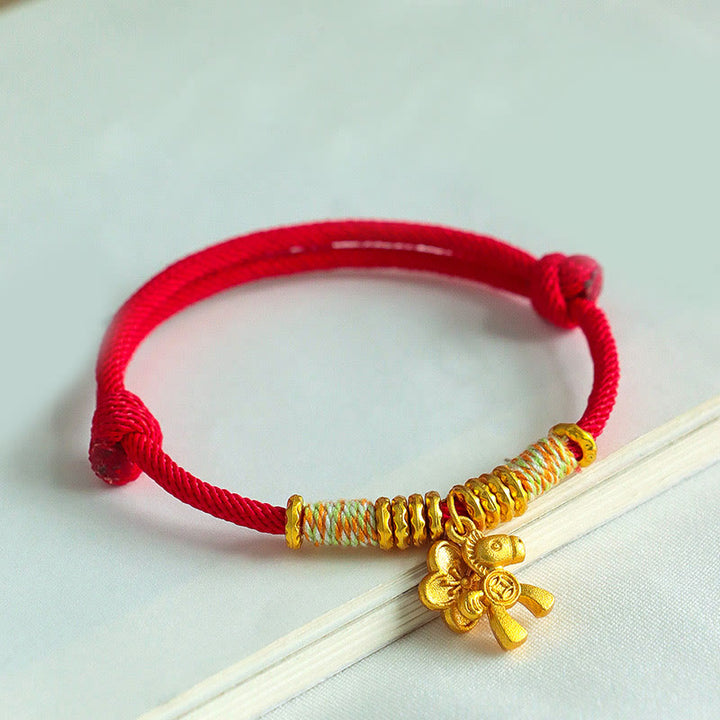 Braccialetto fatto a mano con ciondolo a forma di fiore dell'anno del cavallo con cordino rosso Buddha Stones - image 2