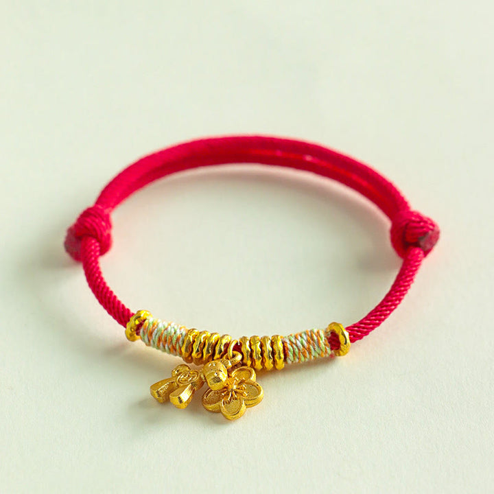 Braccialetto fatto a mano con ciondolo a forma di fiore dell'anno del cavallo con cordino rosso Buddha Stones - image 1
