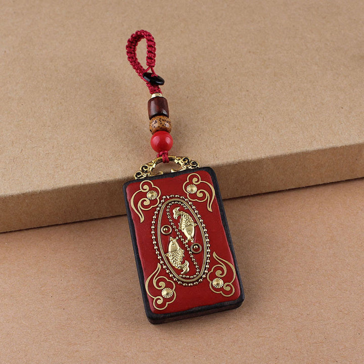 Portachiavi con ciondolo a forma di corda con ciondolo a forma Buddha Stones, fiore di ebano, pesce koi - Corda con bottone rosso - Pesce Koi - image 15