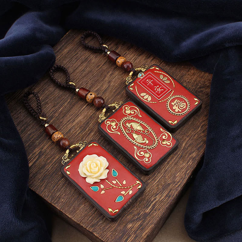 Portachiavi con ciondolo a forma di corda con ciondolo a forma Buddha Stones, fiore di ebano, pesce koi - image 0