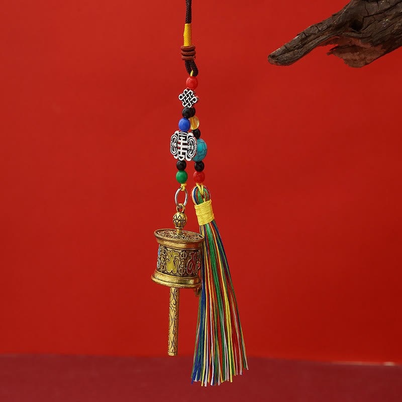 Portachiavi con ruota di preghiera Buddha Stones Om Mani Padme Hum e nappe colorate Purezza - Oro antico - image 0