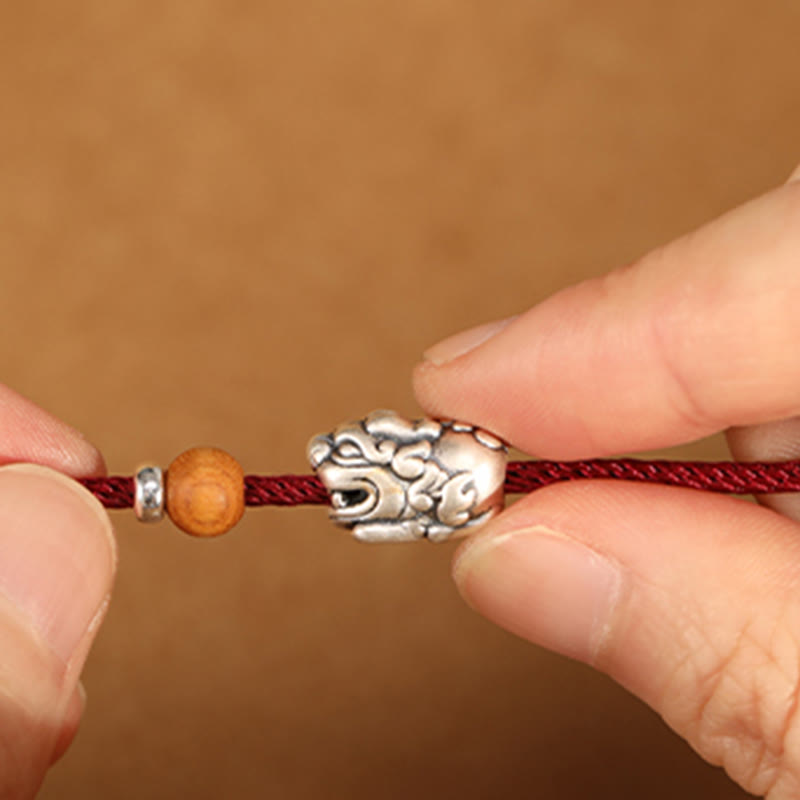 Braccialetto portafortuna intrecciato a mano con perline in legno di pesca, in argento sterling 999, con ciondolo Pixiu Buddha Stones - image 5