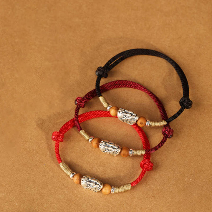 Braccialetto portafortuna intrecciato a mano con perline in legno di pesca, in argento sterling 999, con ciondolo Pixiu Buddha Stones - image 22