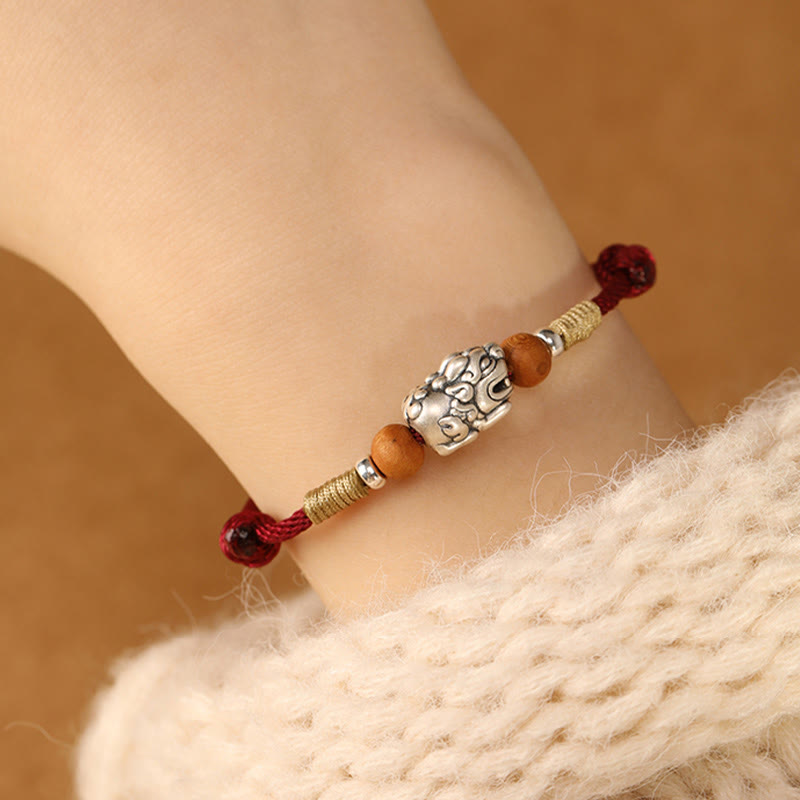 Braccialetto portafortuna intrecciato a mano con perline in legno di pesca, in argento sterling 999, con ciondolo Pixiu Buddha Stones - image 9
