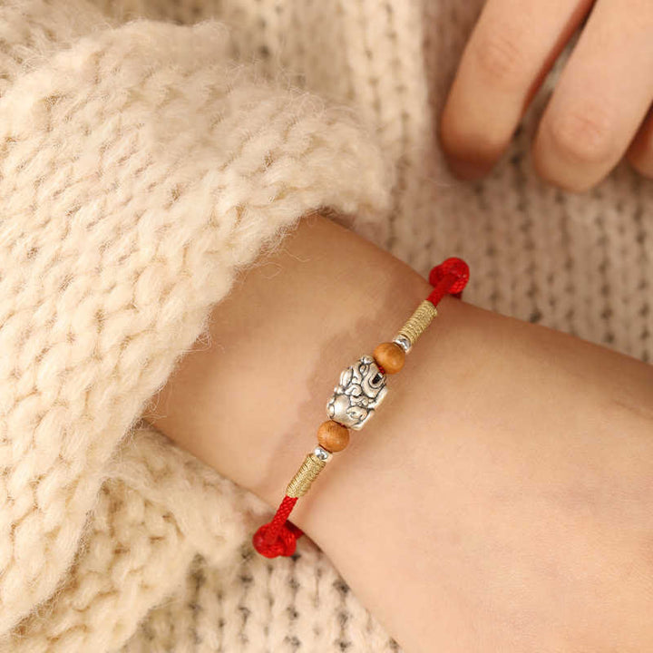 Braccialetto portafortuna intrecciato a mano con perline in legno di pesca, in argento sterling 999, con ciondolo Pixiu Buddha Stones - image 17