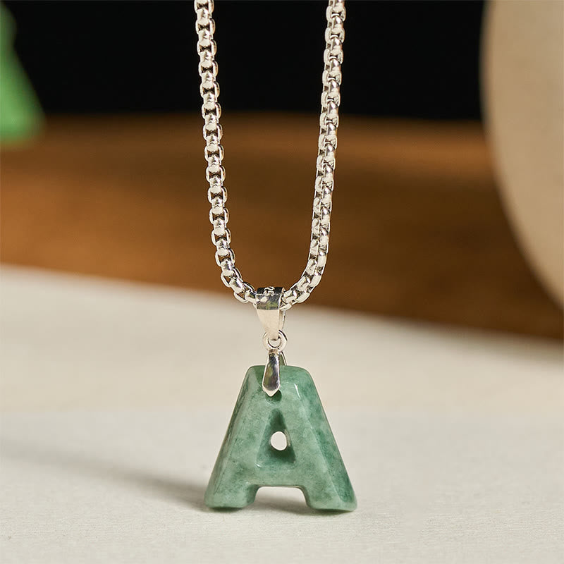 Collana con ciondolo della prosperità in acciaio al titanio con lettera AZ naturale Buddha Stones - UN - image 1