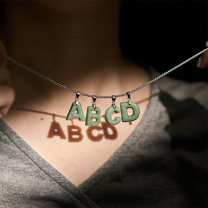 Collana con ciondolo della prosperità in acciaio al titanio con lettera AZ naturale Buddha Stones - image 39