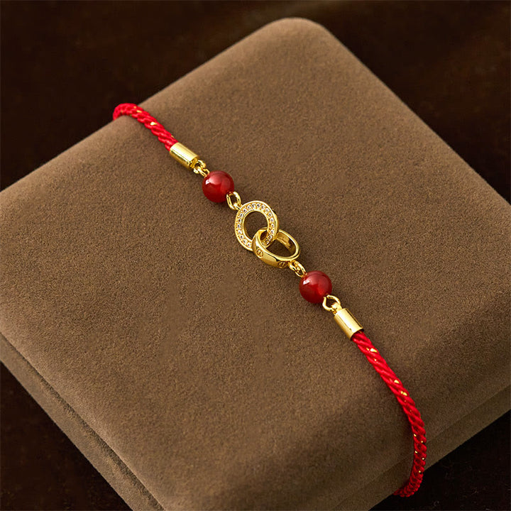 Braccialetto di protezione in corda rossa placcato oro con fibbie per la pace collegate in Buddha Stones - image 2