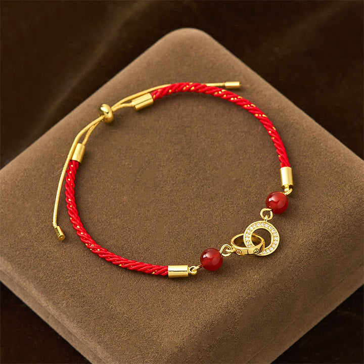 Braccialetto di protezione in corda rossa placcato oro con fibbie per la pace collegate in Buddha Stones - Cordino rosso (circonferenza del polso: 14-22 cm) - image 0