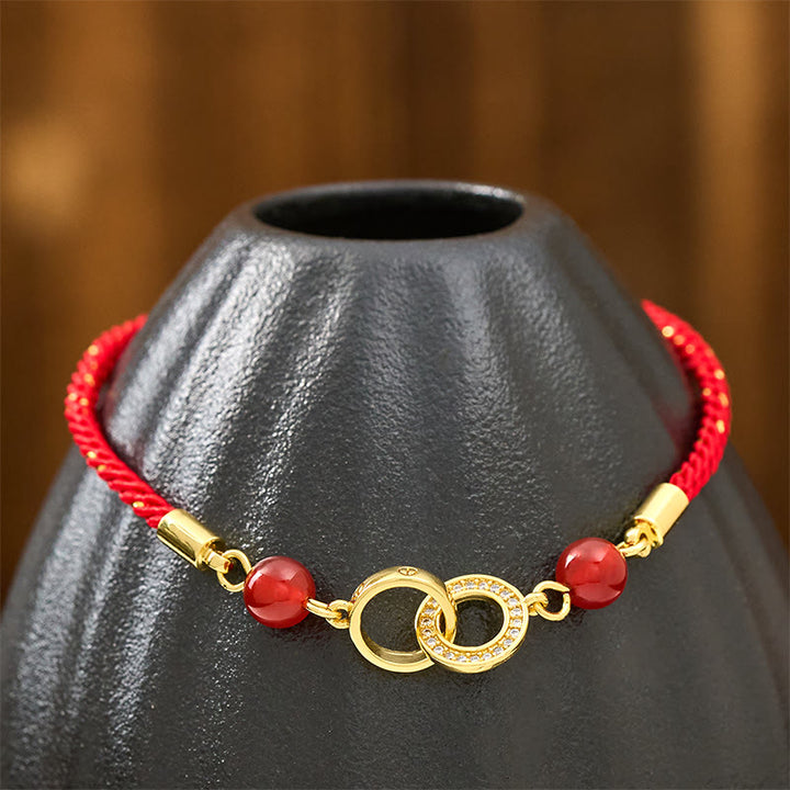 Braccialetto di protezione in corda rossa placcato oro con fibbie per la pace collegate in Buddha Stones - image 3