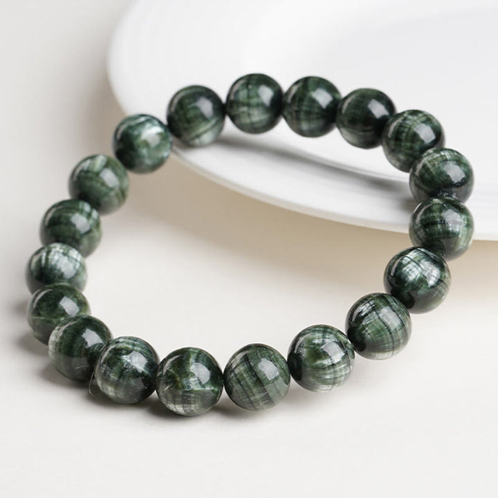 Braccialetto di perline rotonde in serafinite naturale Buddha Stones per l'equilibrio emotivo - image 1
