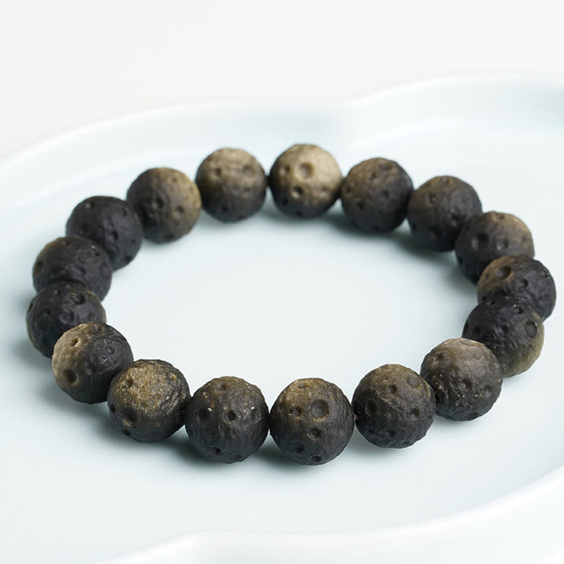 Braccialetto di protezione con perle rotonde in ossidiana dorata e argento naturale Buddha Stones - image 10