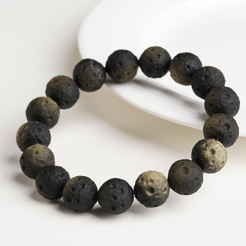 Braccialetto di protezione con perle rotonde in ossidiana dorata e argento naturale Buddha Stones - image 8