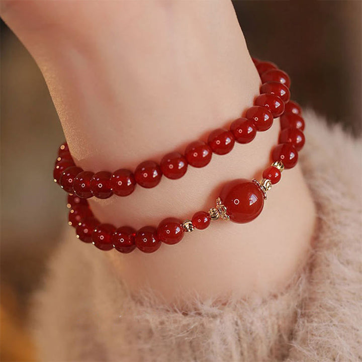 Bracciale Buddha Stones con doppio giro di perline di agata rossa per l'accettazione di sé e la fiducia in se stessi - image 0
