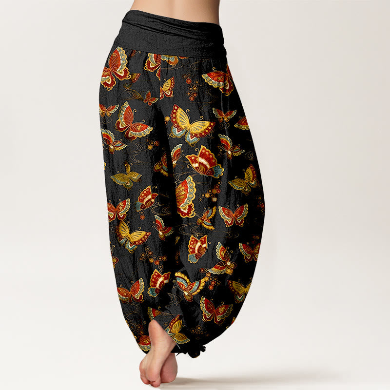 Pantaloni harem da donna con elastico in vita e motivo a farfalla colorata in cotone Buddha Stones - image 1