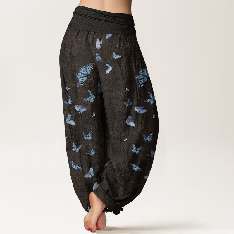 Pantaloni harem da donna con elastico in vita e motivo a foglie e farfalle in cotone Buddha Stones - image 1