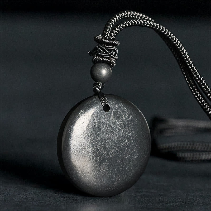Collana con ciondolo in pietra di shungite autentica, forma geometrica rotonda, forza interiore, Buddha Stones - Pietra di shungite (diametro: 30 mm) - image 0