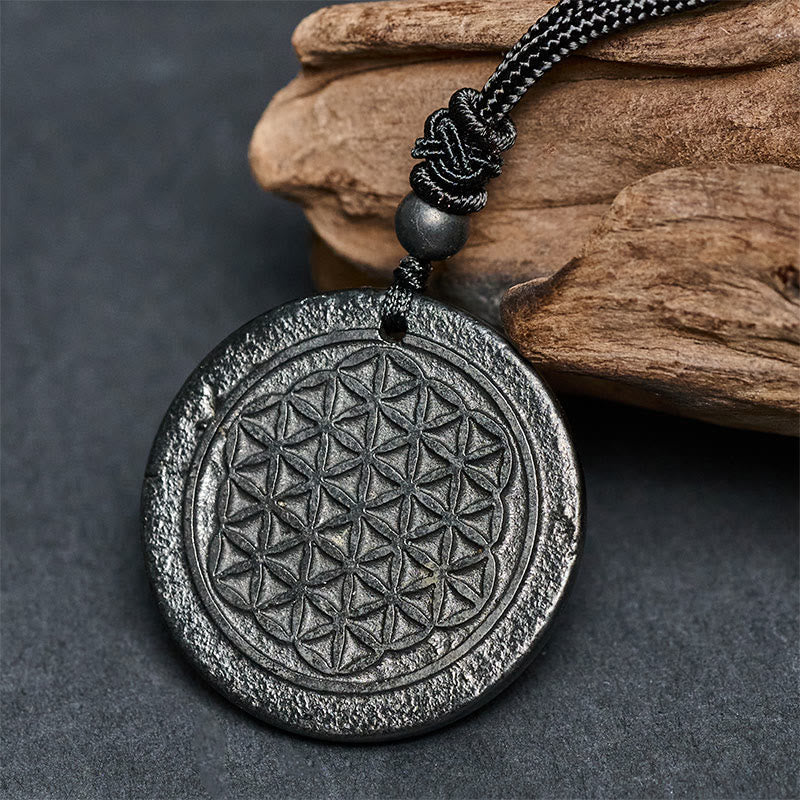 Collana con ciondolo di protezione in pietra di shungite autentica con intaglio del fiore della vita Buddha Stones - image 1