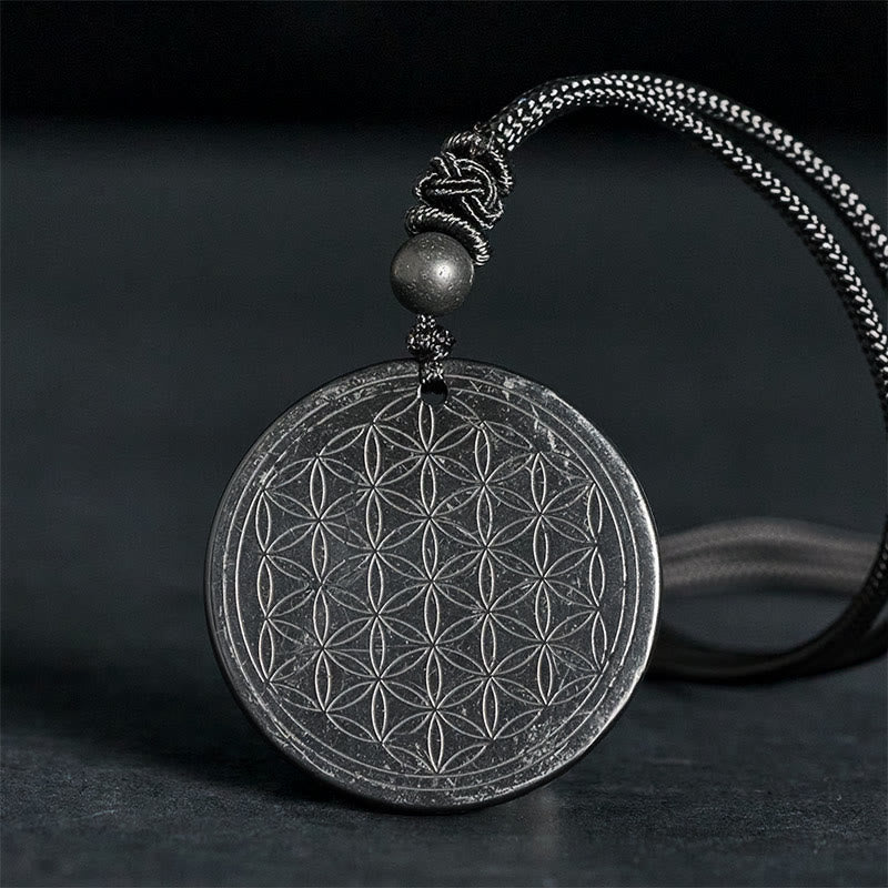 Collana con ciondolo di protezione in pietra di shungite autentica con intaglio del fiore della vita Buddha Stones - Fiore della Vita (Intaglio) - 35-40 mm - image 9