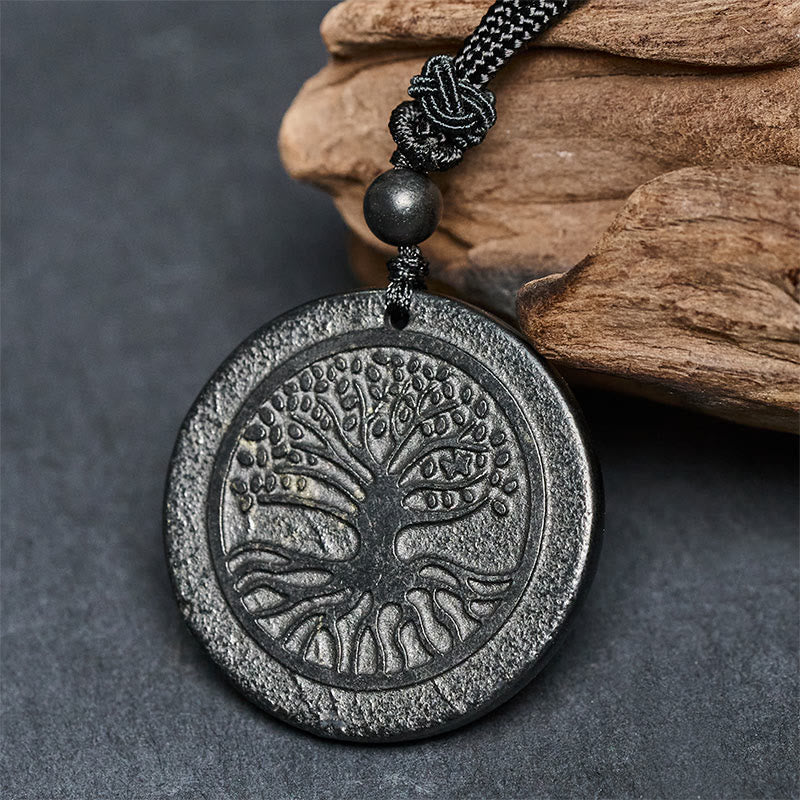 Collana con ciondolo di protezione in pietra di shungite autentica con motivo intagliato dell'albero della vita Buddha Stones - image 1