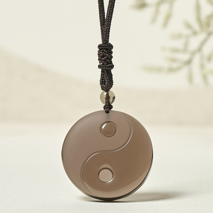 Collana con ciondolo positivo in ossidiana di ghiaccio e simbolo Yin Yang Buddha Stones - Ossidiana di ghiaccio (diametro: 36 mm) - image 0