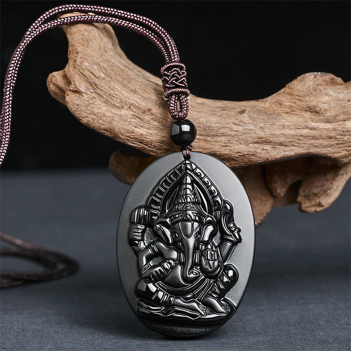 Collana con ciondolo in ossidiana nera naturale con design in rilievo di elefante Buddha Stones - image 1