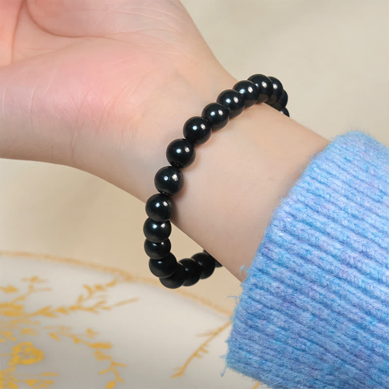 Braccialetto di perline con forza interiore in pietra di shungite autentica e rotonda Buddha Stones - image 10