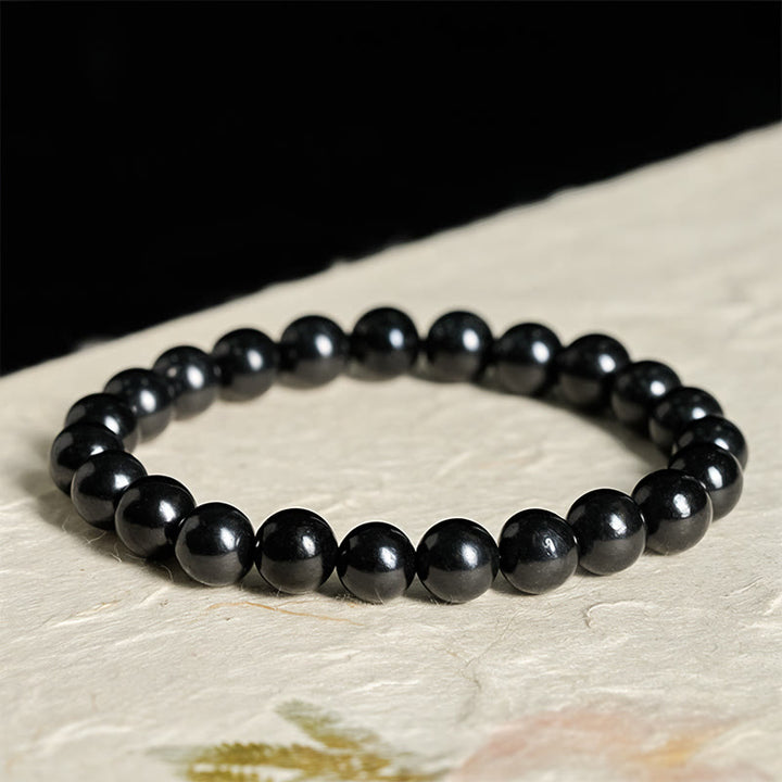Braccialetto di perline con forza interiore in pietra di shungite autentica e rotonda Buddha Stones - image 8