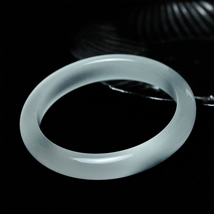 Bracciale rigido spirituale con occhio di gatto bianco Buddha Stones - image 1