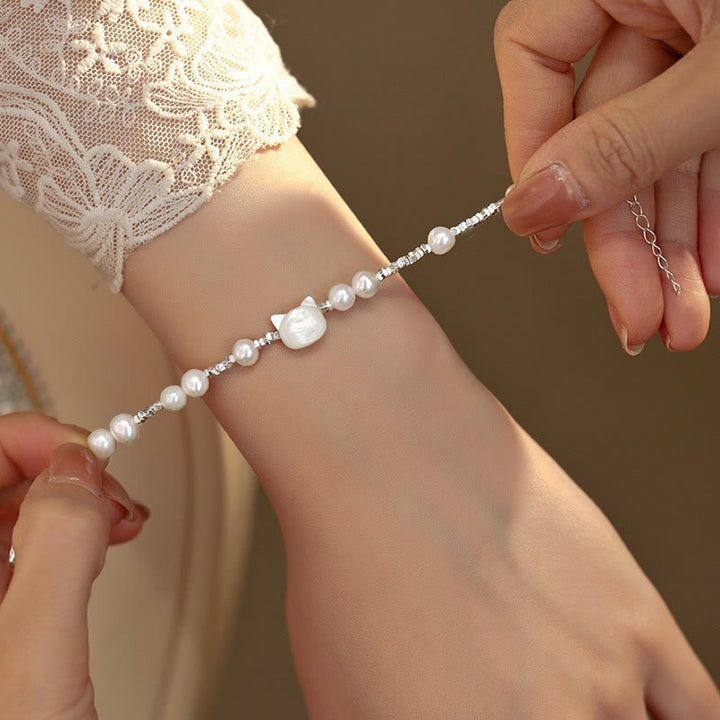 Braccialetto di guarigione con catena in argento e pietra di tridacna con testa di gatto e pietre Buddha Stones - image 3