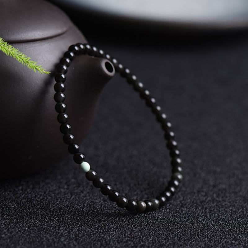 Bracciale Buddha Stones in ossidiana nera, turchese e forza per la realizzazione - image 2