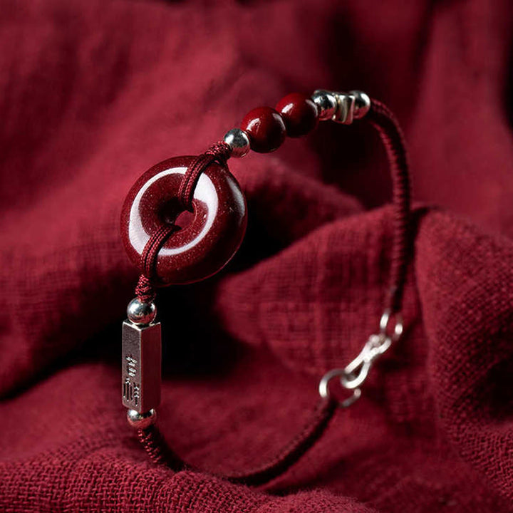 Bracciale con treccia di collegamento in argento sterling 925 con fibbia della pace in cinabro Buddha Stones - image 0