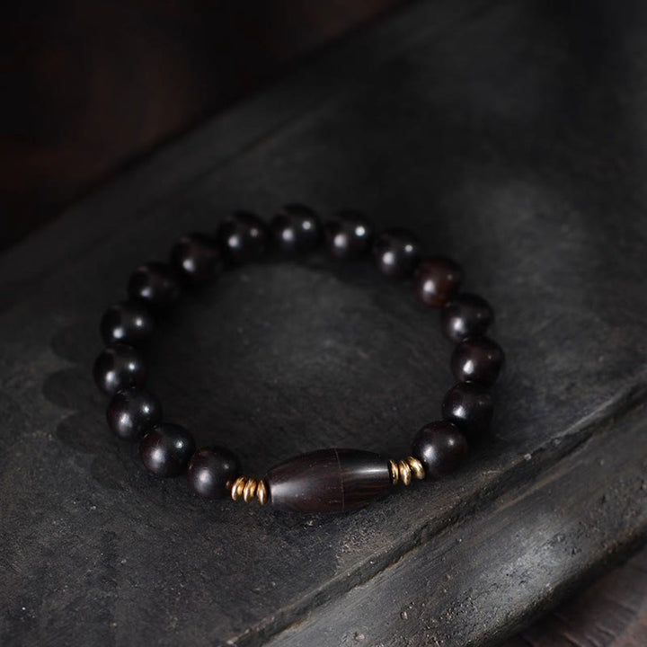 Braccialetto di protezione con perline di ebano e rotolo di Sutra con Buddha Stones - image 3