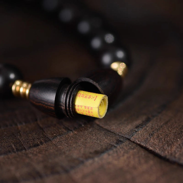 Braccialetto di protezione con perline di ebano e rotolo di Sutra con Buddha Stones - image 8