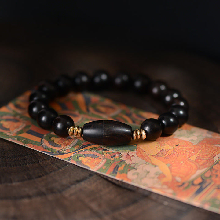 Braccialetto di protezione con perline di ebano e rotolo di Sutra con Buddha Stones - 16-17 cm - image 0