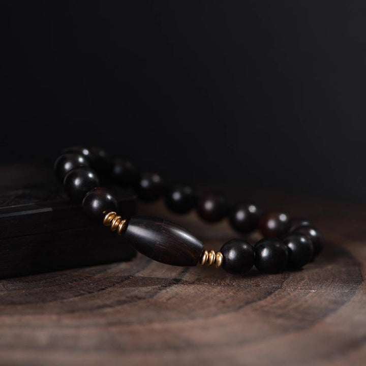 Braccialetto di protezione con perline di ebano e rotolo di Sutra con Buddha Stones - image 4